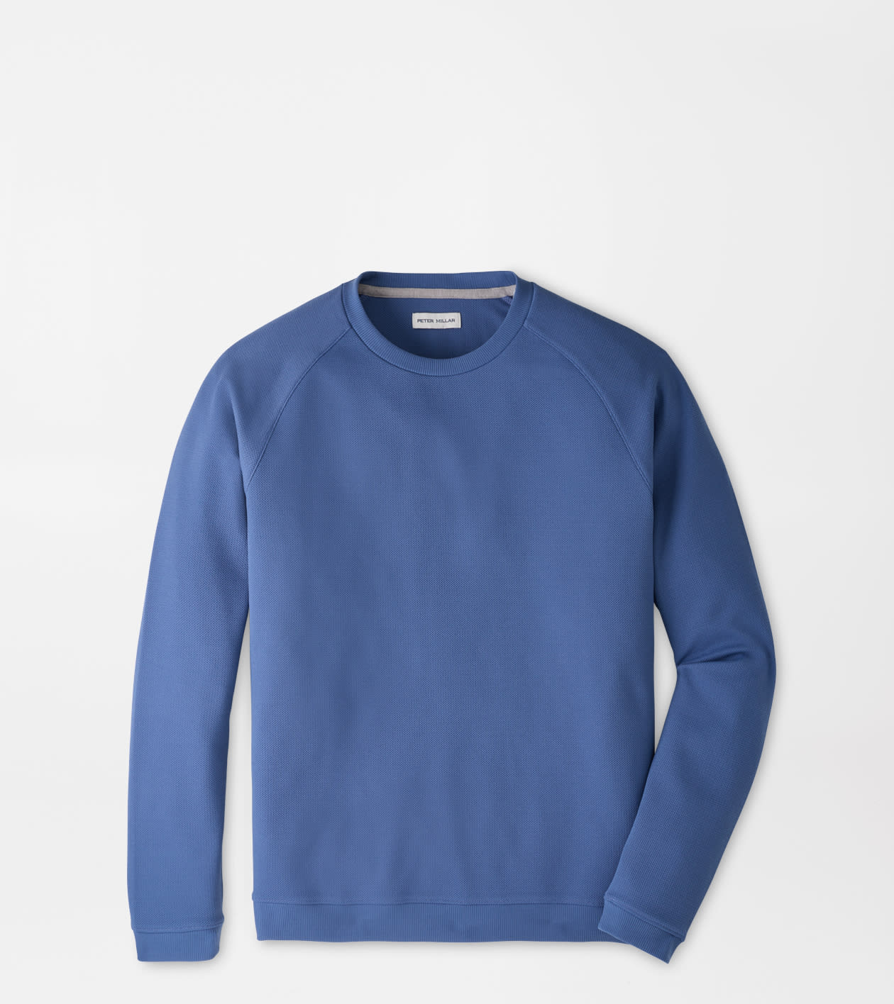 A blue crewneck sweatshirt with raglan sleeves, laid flat against a light gray background.