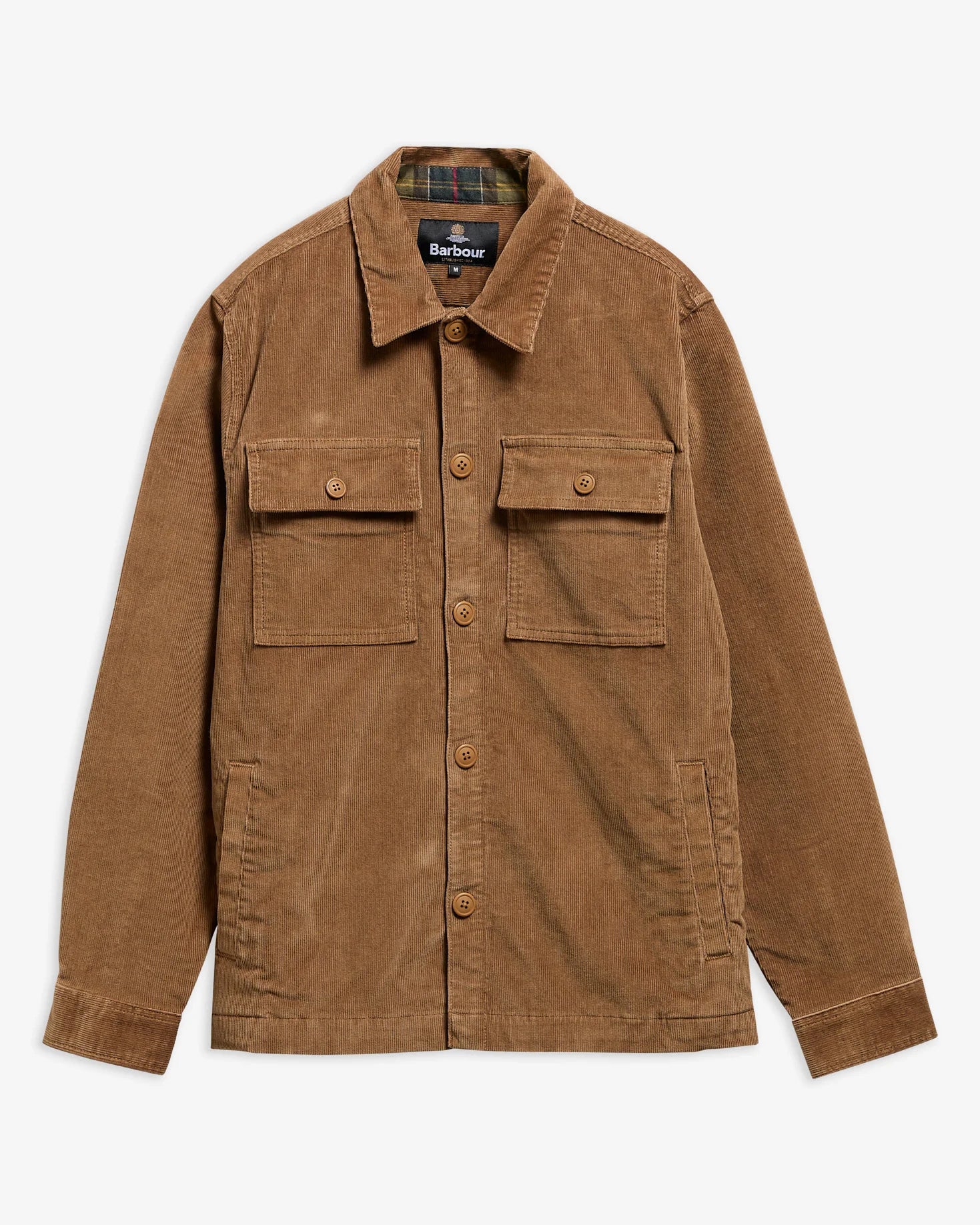 A brown corduroy utility jacket by Barbour, featuring a button-down front, two chest flap pockets, and a plaid interior lining, shown against a light gray background.