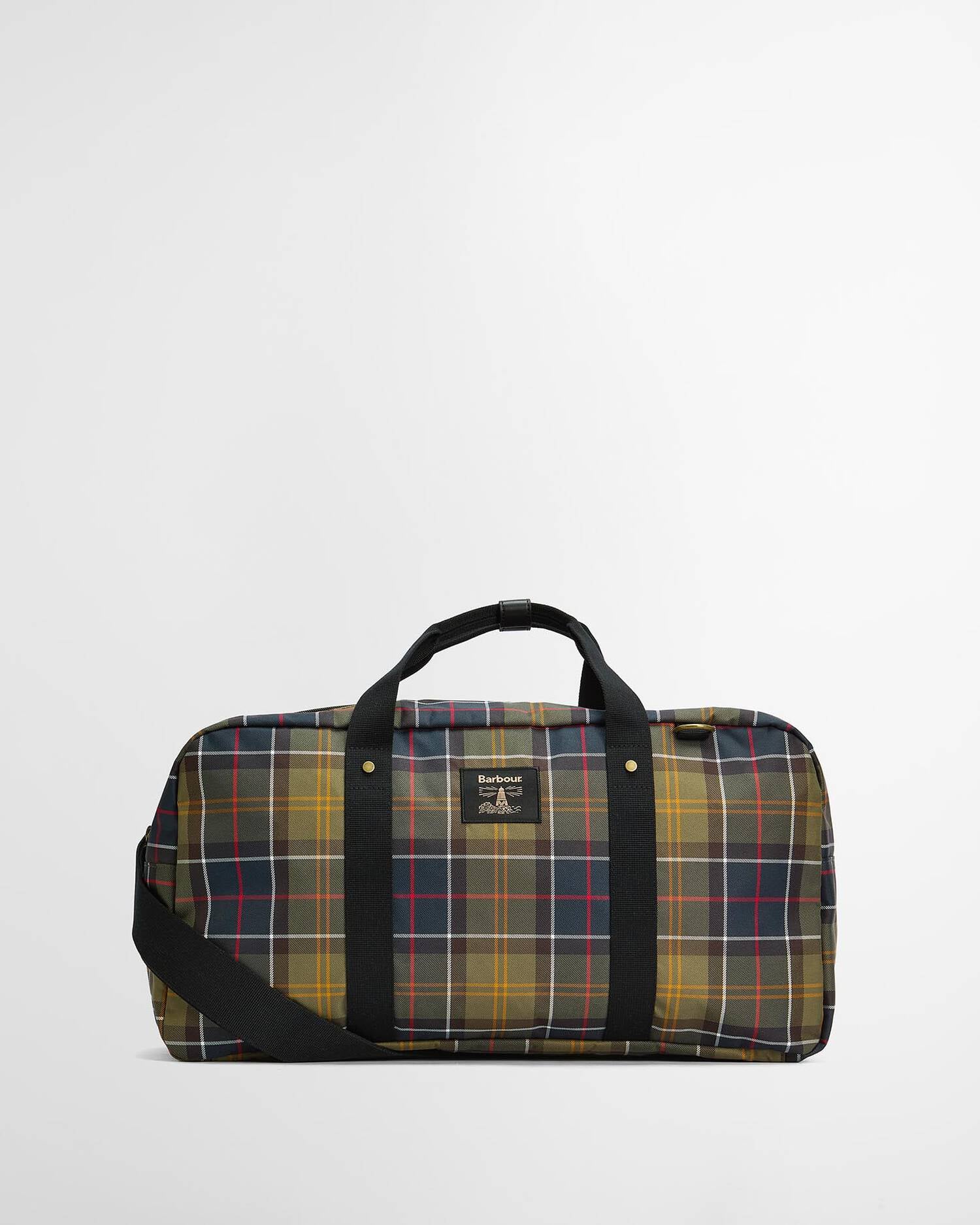 Plaid duffel bag with black straps on a light gray background