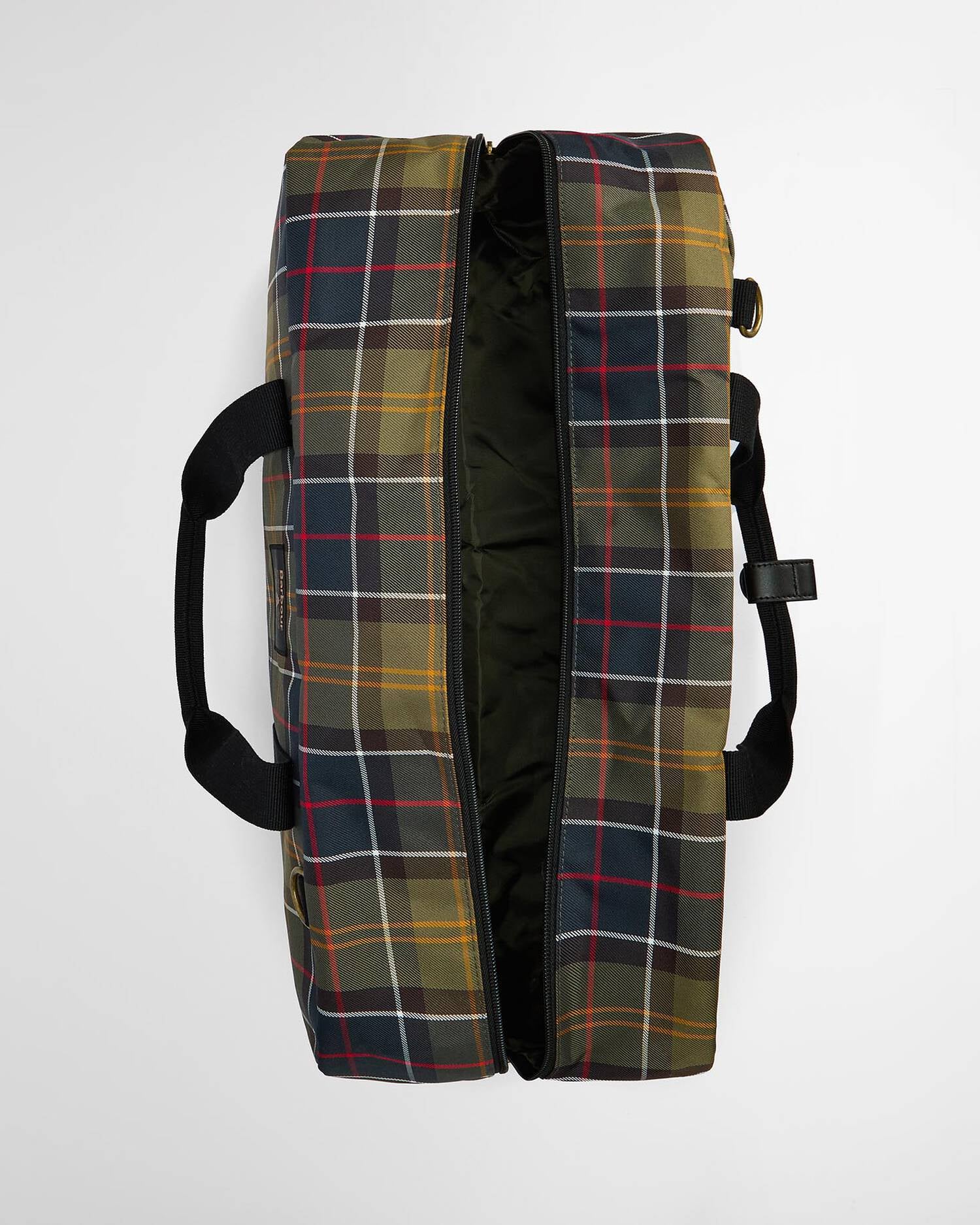 A Barbour canvas duffel bag with a classic plaid pattern in olive green, navy blue, red, and yellow, shown open to reveal its black interior and black handles against a light gray background.
