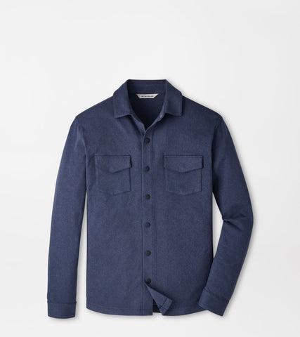 A navy blue long-sleeve button-up shirt jacket with two chest flap pockets, displayed on a clean white background.