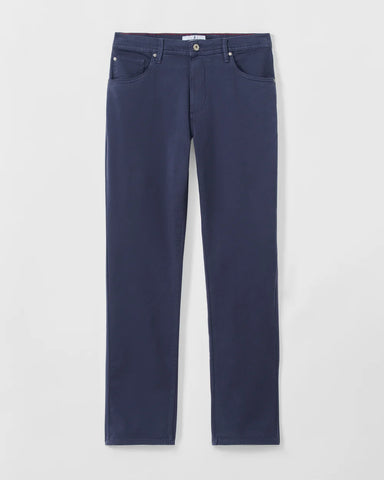 A pair of dark navy blue slim-fit jeans shown flat against a light gray background.